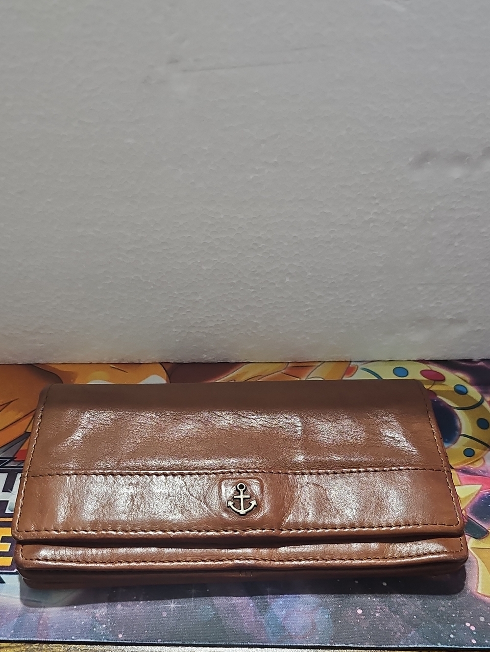 Brown Leather Fold-Over Wallet with Anchor Accent